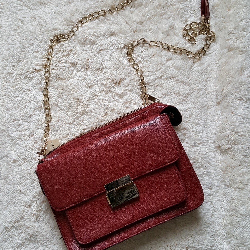 Red faux leather crossbody bag